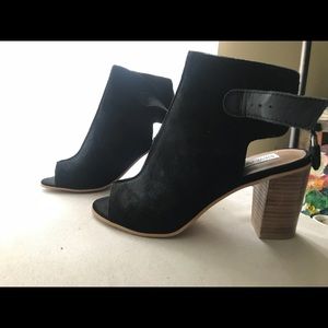 Heeled peep toed booties